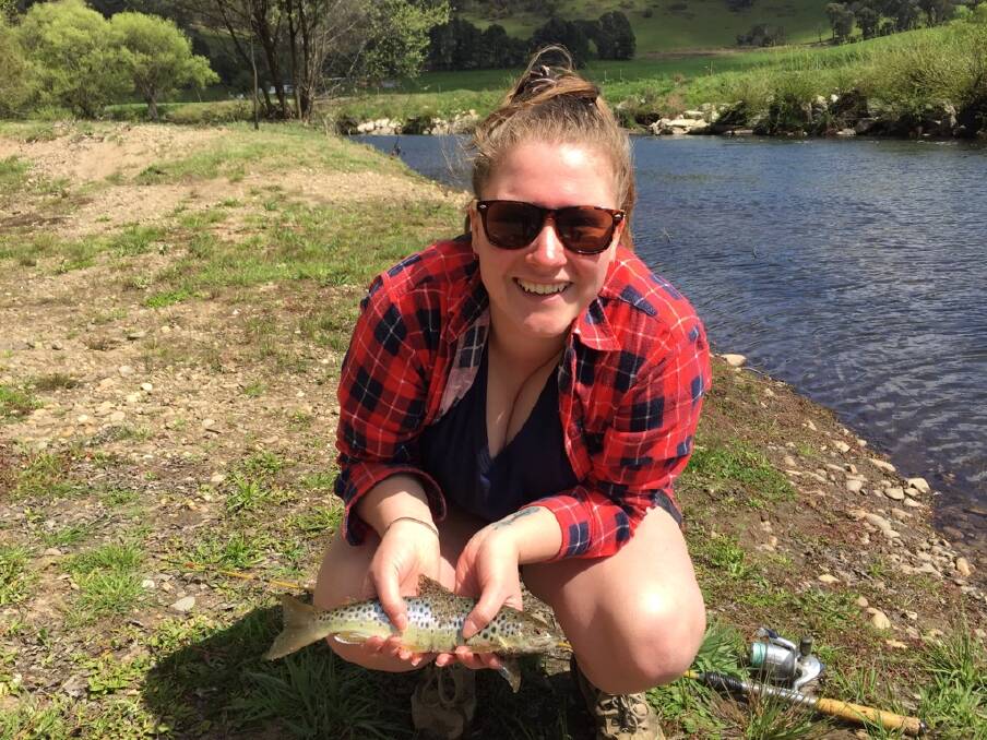 RIPPER: Reader Dani Sanderson, 19, caught this beauty of a brown trout while fishing with worm rods over at Eskdale. You can send your fishing pics, along with a few details, to 0475 947 279 or 0475 953 605.