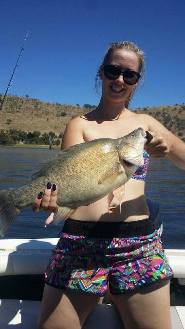 SUCCESS: Jess Smith had a fish after helping release 170,000 golden perch at Lake Hume on February 3. She caught and released her first yella, measuring 62cm. 