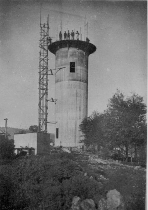 TALL ORDER: Photo shows the town's water tower under construction in 1924. It was deemed of insufficient capacity in 1949.