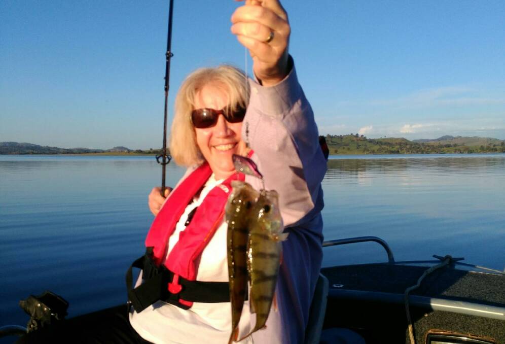 SUCCESS: Bronwyn Wighton outfished her husband, with two redfin hitting the lure at the same time (though he did select the lure). Some good reports are starting to come in. 