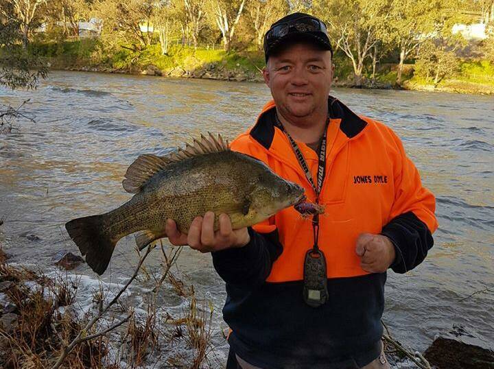 GOT HIM: Rick Doyle had some luck using a purple vibe lure during a recent expedition to Lake Hume. Anglers fishing from the bank are having success there.