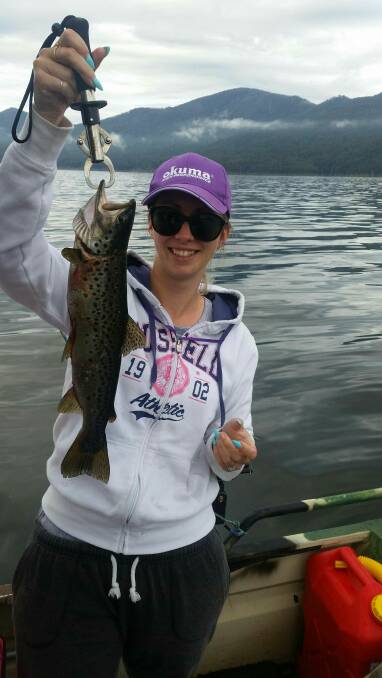 CHAMPION: Keen angler Jess Smith won a fishing rod combo after catching the best trout during the recent Dartmouth women's fishing classic. 
