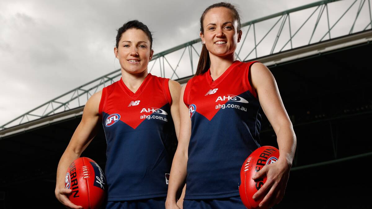 Melissa Hickey and Daisy Pearce of the Demons pose for a photograph during the Women's League marquee player announcement. Picture: MICHAEL WILSON/AFL/GETTY IMAGES
