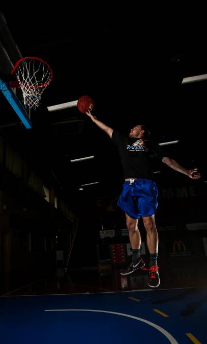 READY TO FINGER ROLL: Albury-Wodonga Bandits point guard Ben Kearins gets some practice in before this weekend's game. Picture: JAMES WILTSHIRE
