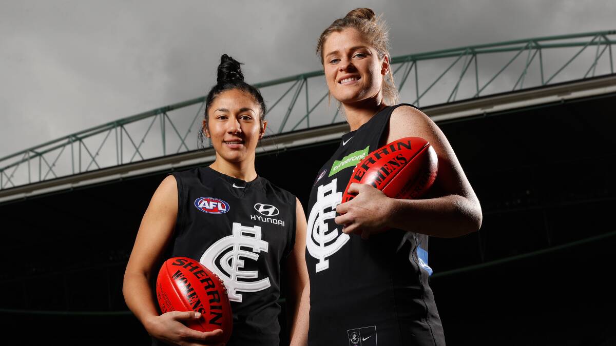 Darcy Vescio and Briana Davey of the Blues pose for a photograph during the Women's League marquee player announcement . Picture: MICHAEL WILSON/AFL/GETTY IMAGES