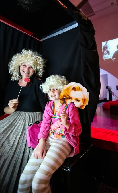 MAMA's DAY: Keisha and Avalon-May Barton, 7, from Gundowring enjoy the final day of the Marilyn Monroe exhibition in Albury on Sunday. Picture: JAMES WILTSHIRE