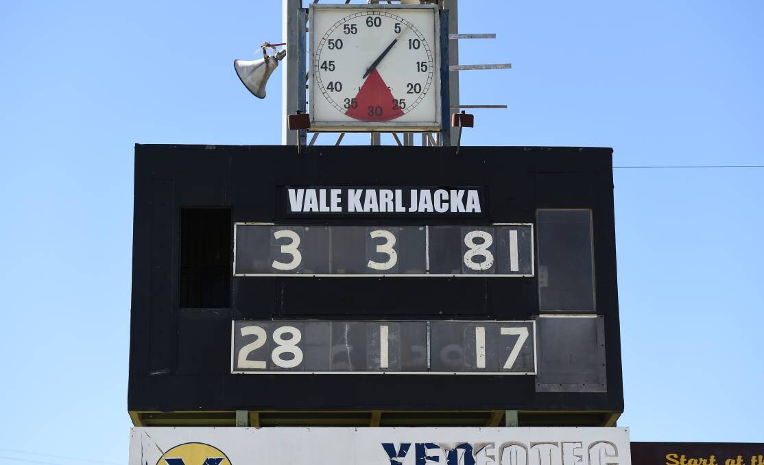 NICE TOUCH: The dates of Karl Jacka's birth and passing were posted on the old scoreboard at Lavington Oval during his funeral service.
