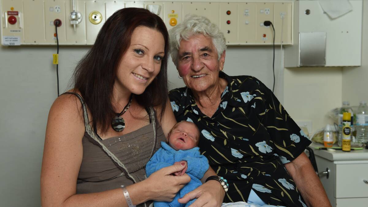 MIRACLE BUB: Mum Rikki Bennett, son Logan Peter and great-grandmother Dot Looker at Wodonga hospital on Monday following his dramatic entry to the world. Picture: MARK JESSER