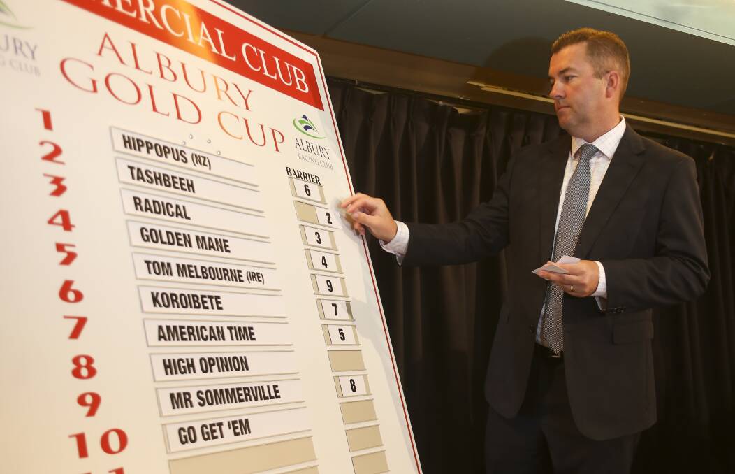 LUCKY NUMBER: Albury Racing Club chief executive officer John Miller at the Gold Cup barrier draw at the Commercial Club on Tuesday. Picture: ELENOR TEDENBORG