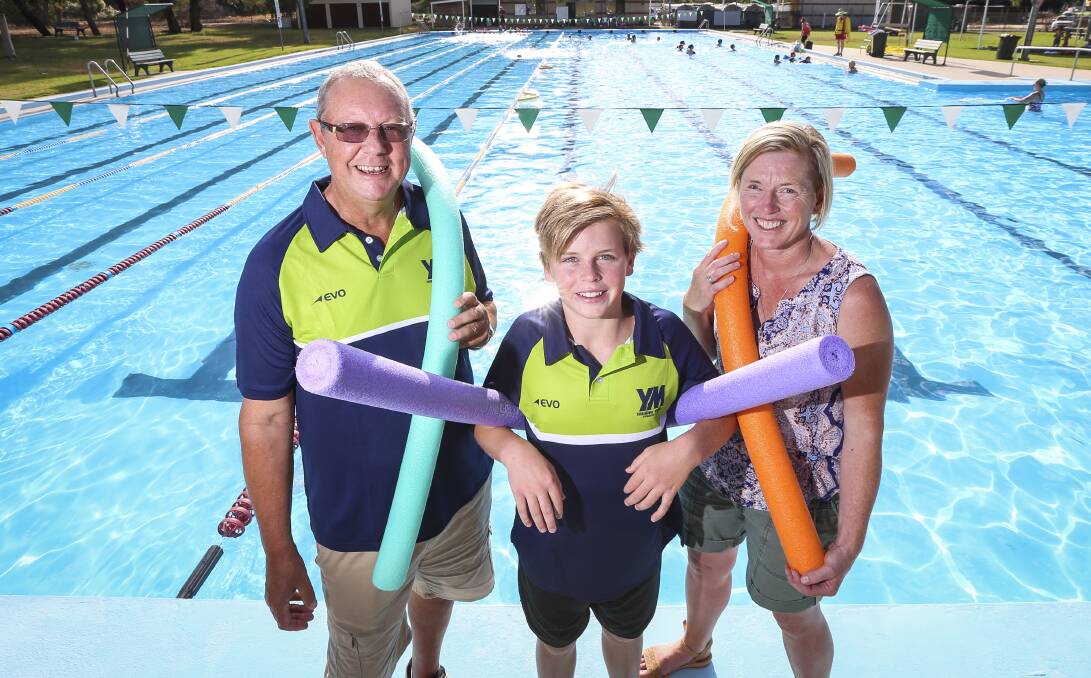 ON YOUR MARKS: YARC's Dario Prighel, left, and Yarrawonga-Mulwala Swim Club's Tracey Mullins and son Darby. Picture: JAMES WILTSHIRE