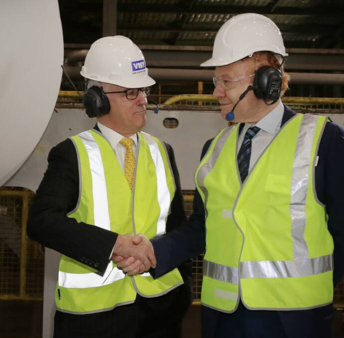 GOOD WORK: PM Malcolm Turnbull and Visy chairman Anthony Pratt at Tumut on Wednesday. Picture: FAIRFAX MEDIA
