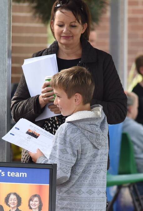 SNAPPED: Farrer MP Sussan Ley was spotted out and about handing out how to vote cards for former mayor Alice Glachan. Picture: MARK JESSER