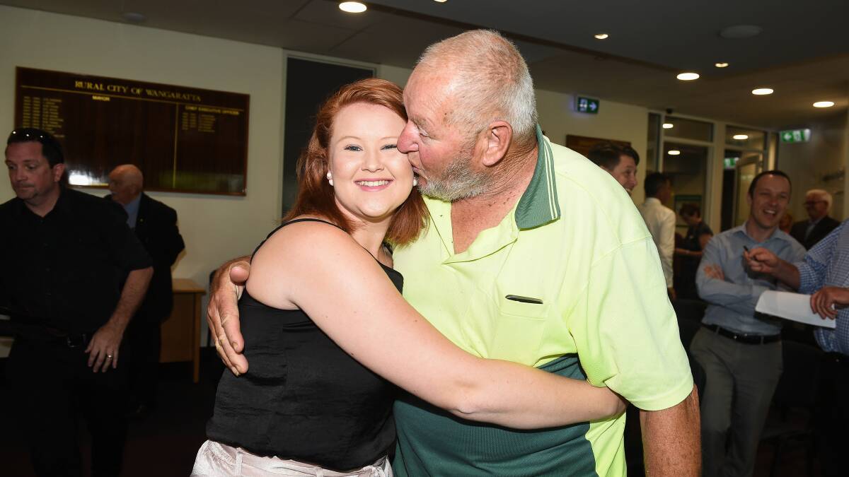 GO GIRL: Wangaratta Council newcomer Ashlee Fitzpatrick is congratulated on her countback win by grand-father Alan. Picture: MARK JESSER