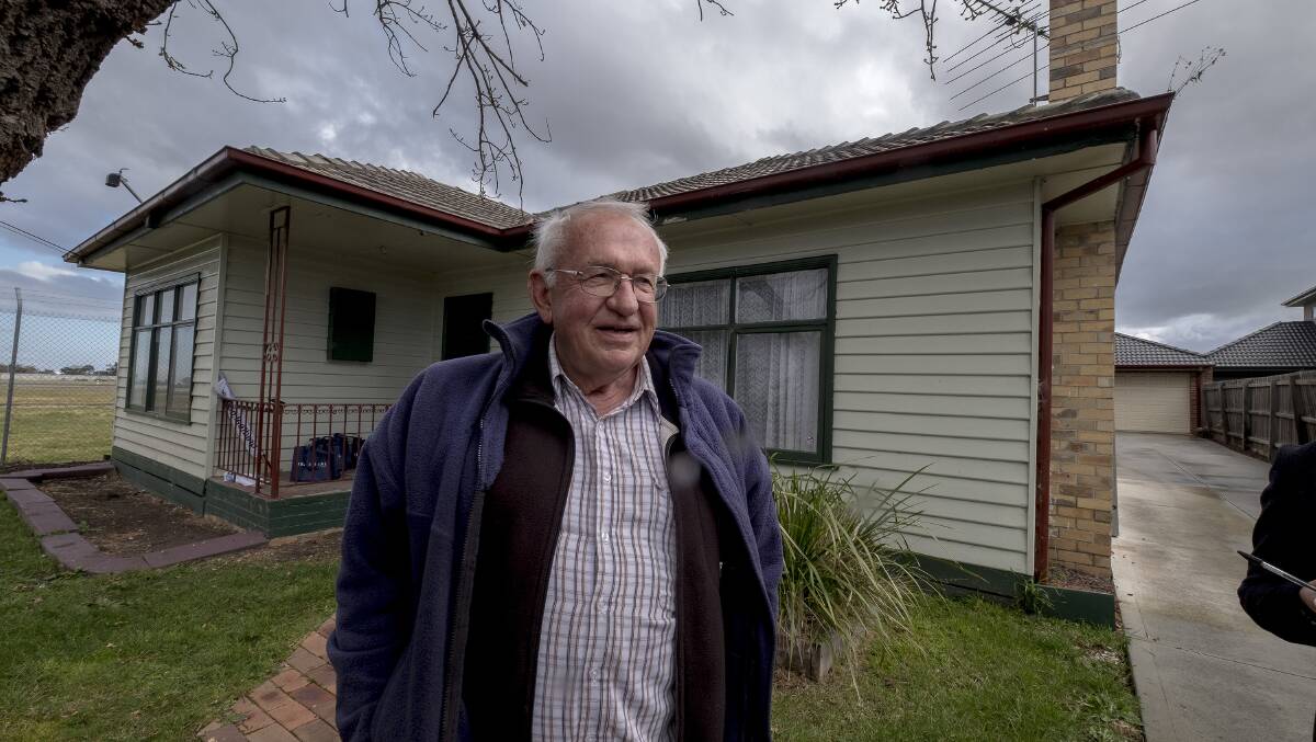 HAPPIER TIMES: Beechworth's George Fendyk after purchasing the Castle House at auction in 2016. His plans for the house to be part of a caravan park are on hold.