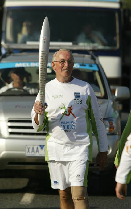 MAGIC MOMENT: Les O'Brien took part in the Queen's baton relay in lead-up to 2006 Commonwealth Games in Melbourne.