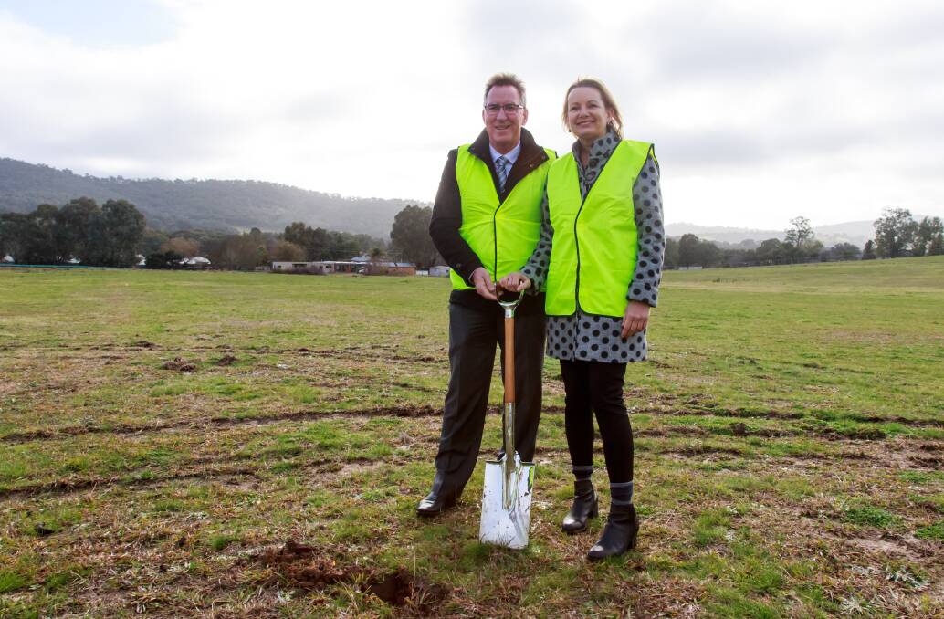 SHOVEL READY: Albury mayor Kevin Mack and Farrer MP Sussan Ley turn first sod on the Lavington Sportsground upgrade. Picture: SIMON BAYLISS