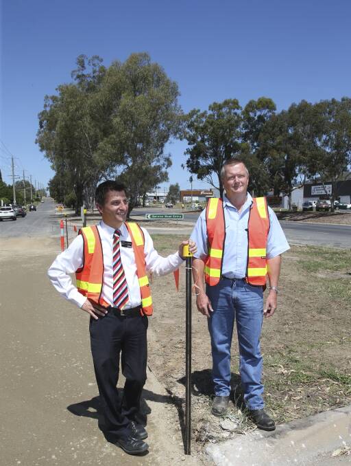READY TO ROLL: Wodonga Council's Theo Panagopoulos, left, and Excell Gray Bruni director Geoff Hayes in Thomas Mitchell Drive. Picture: ELENOR TEDENBORG