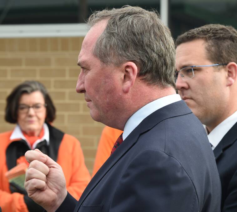 ALL EARS: Indi MP Cathy McGowan listens to Barnaby Joyce's press conference. Pictures: MARK JESSER