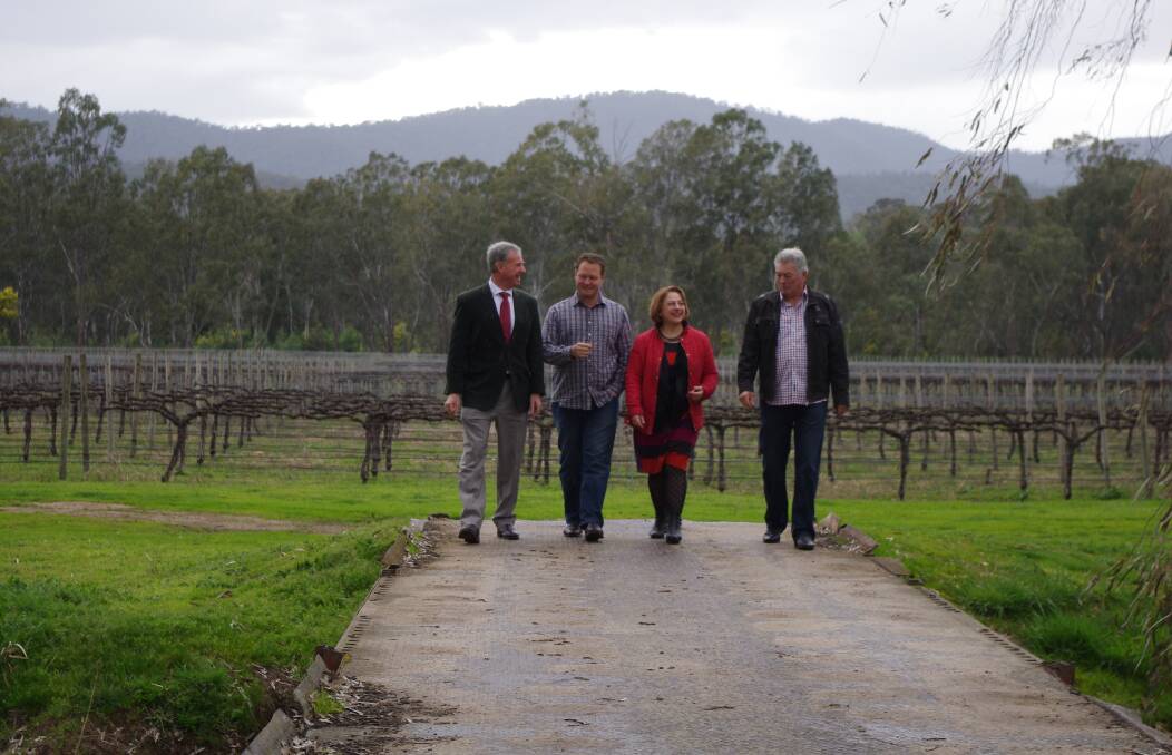 TOUR TIME: Senator Richard Colbeck, Michael Dal Zotto, Sophie Mirabella and Otto Dal Zotto in the King Valley on Tuesday. They discussed the wine equalisation tax and telecommunications issues.