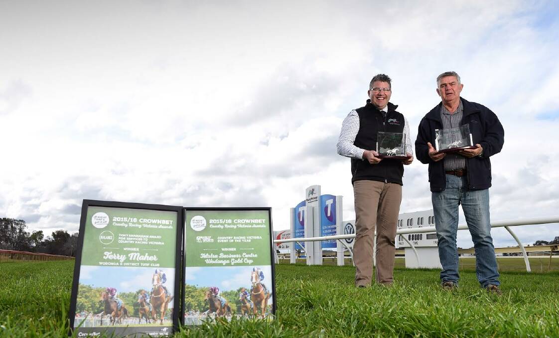TOP GONGS: Racing Wodonga general manager Tom O'Connor, left, and club stalwart Terry Maher. Picture: MARK JESSER