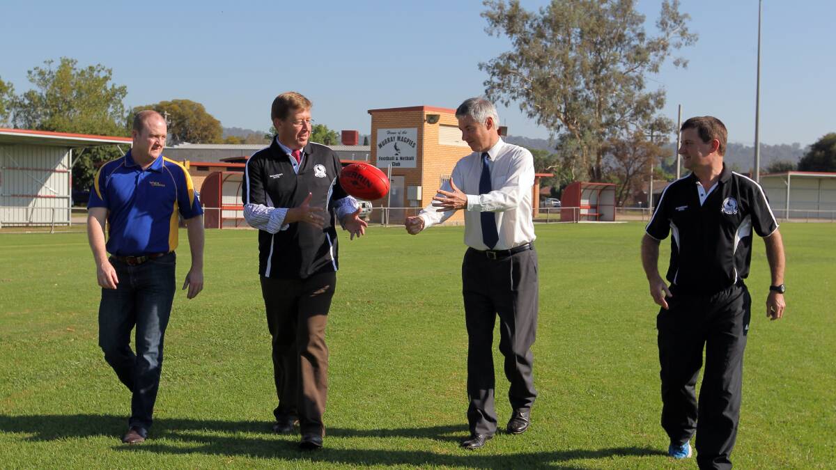 FLASHBACK: Former NSW deputy premier Troy Grant, second from left, with member for Albury Greg Aplin, second from right, at Urana Road Oval in 2015.