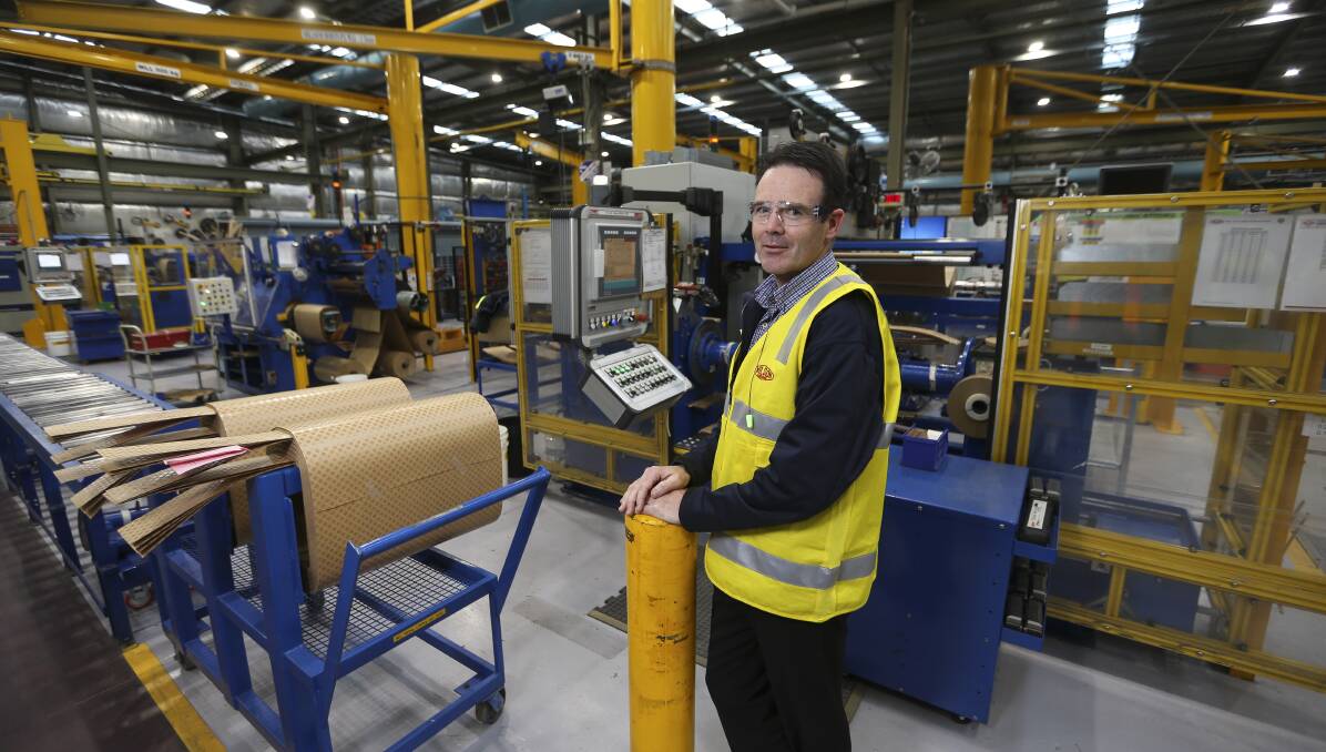 SURGING AHEAD: Wilson Transformers finance manager Brett Robertson at its Moloney Drive headquarters. Picture: ELENOR TEDENBORG