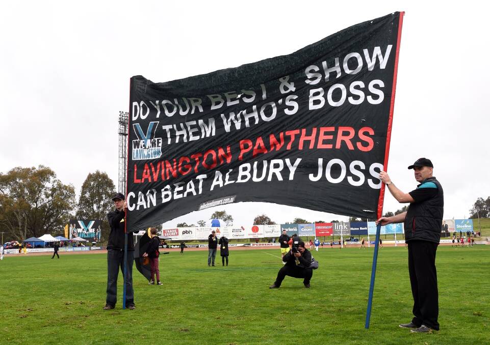 POINT MADE: Lavington Panthers' banner had a dig at the Albury Tigers' benefactor, the Joss Group, before the grand final.