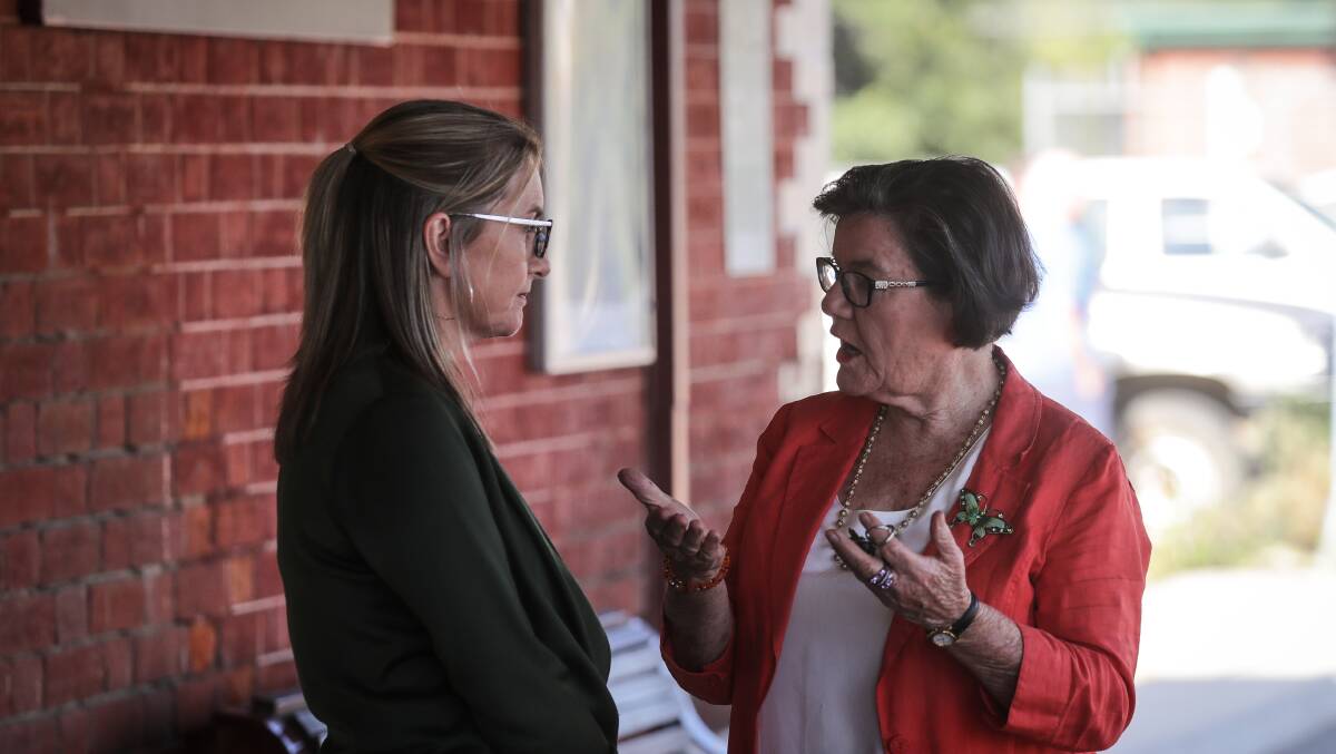 Victorian public transport minister Jacinta Allan, left, and Indi MP Cathy McGowan talk tactics on North-East railway line in Benalla on Monday. Picture: JAMES WILTSHIRE