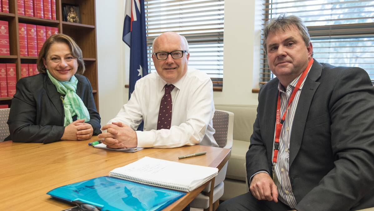 BACK ON TRACK: Sophie Mirabella, federal Arts Minister George Brandis and Wangaratta Jazz Festival chairman Paul Squires met in Canberra.
