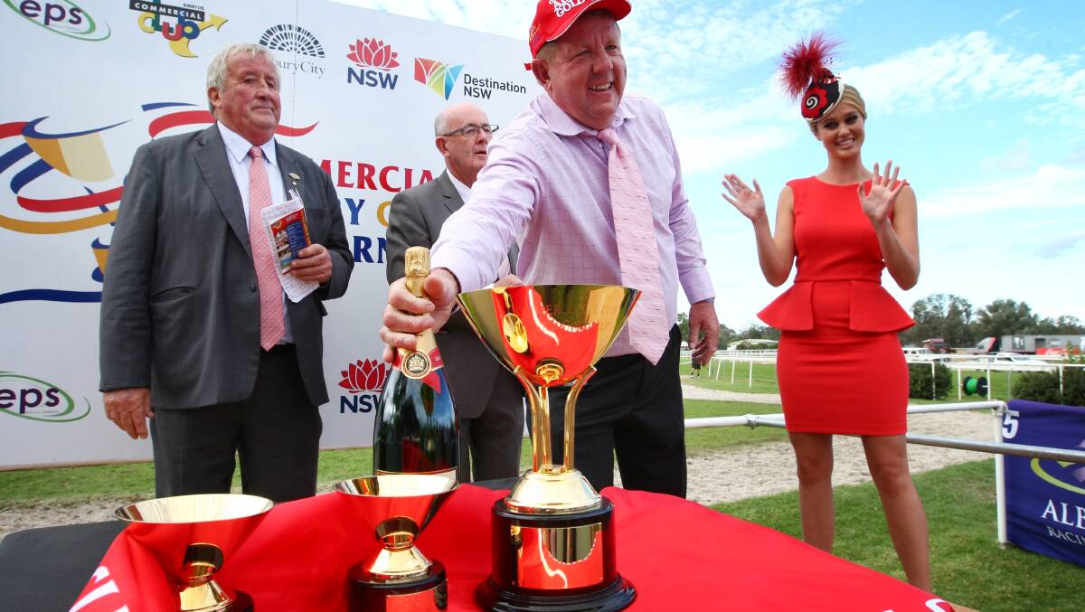 Albury Racing Club president David Wallace, left, at the Gold Cup presentation in 2013 following the win by Albury trainer Brett Cavanough with Niblick.
