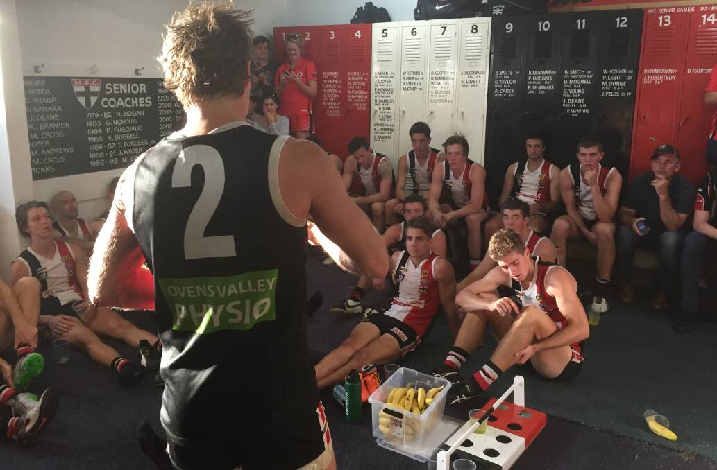 MISSION ACCOMPLISHED: Saints co-coach Brad Murray addresses his players after rousing five-point win against Lavington on Saturday.