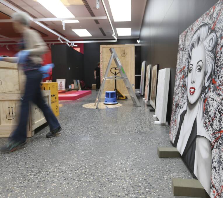 BEHIND SCENES: It was all hands on deck to have the Marilyn Monroe exhibition ready by Friday opening.