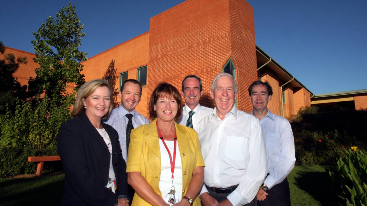 FLASHBACK: Leigh McJames, fourth from left, with other members of the Albury-Wodonga Health senior management team in 2010.