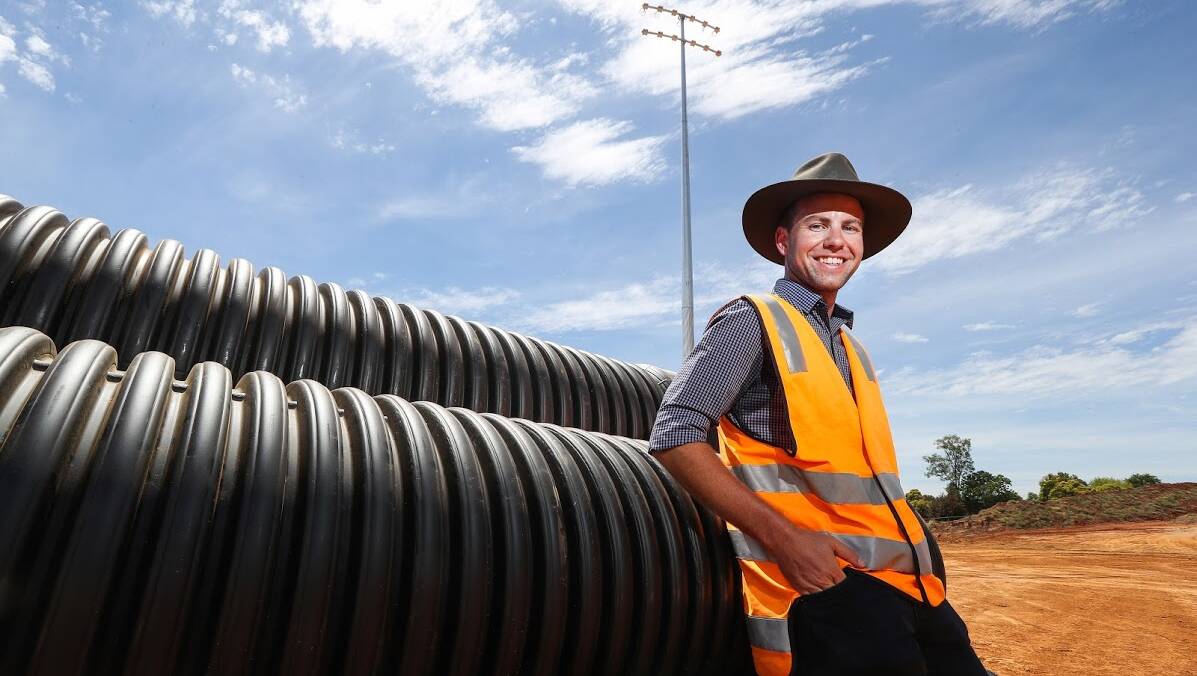 LET THERE BE LIGHT: Albury Council's Anthony Bisignano at the Lavington Sportsground development site where light towers are being installed this week. Picture: MARK JESSER