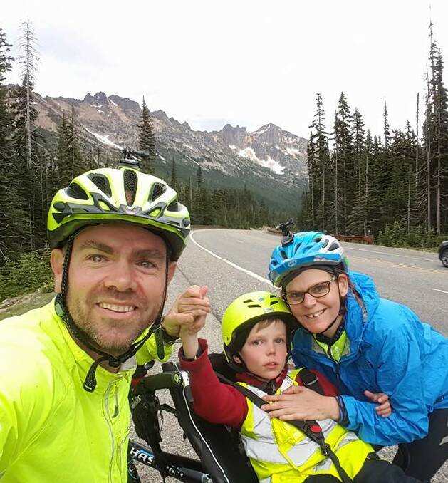 MILESTONE: Travis and Fiona Saunders with their son, Patrick, or “Patch”, who has autism. Picture: SCHOOL OF THE ROAD