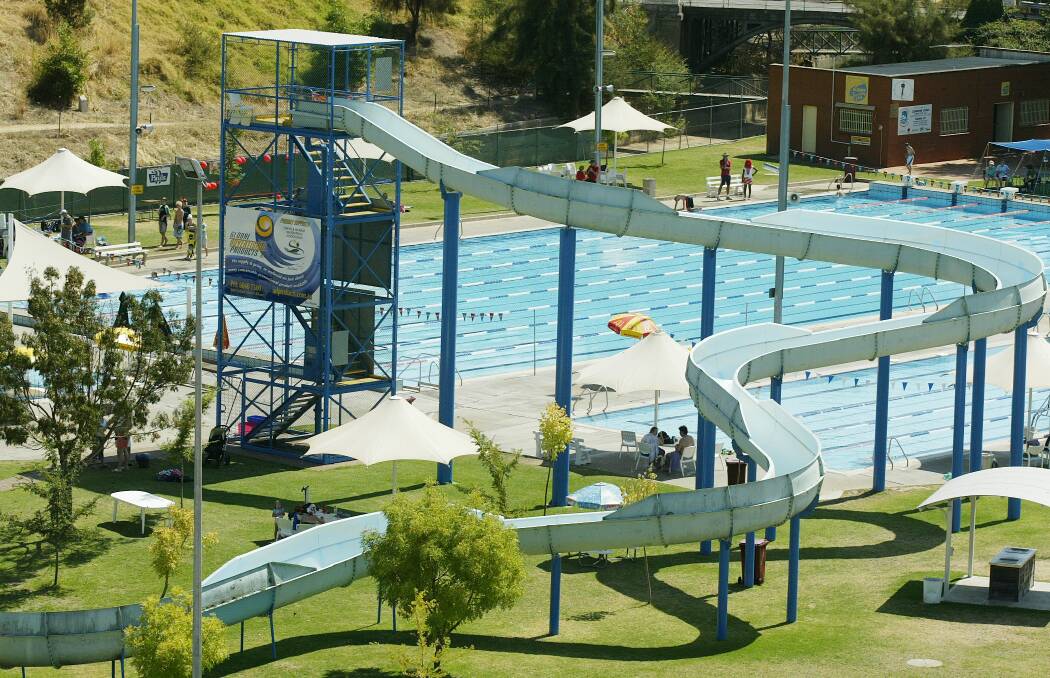 SCARY FALL: Paramedics say a young girl received head injuries after falling down the waterslide stairs at Albury.