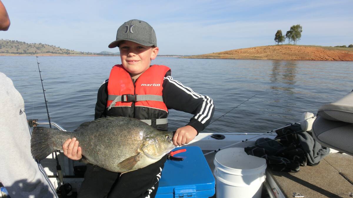 BIG CATCH: People of all ages cast a line into Lake Hume at the weekend in a bid to take home a prize in a fishing competition.