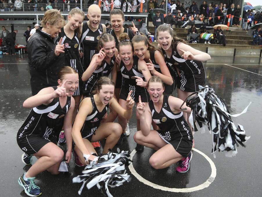 NUMBER ONE: Wangaratta under 16s celebrate at the Ovens and Murray grand final on Sunday, following a thrilling three-goal win over the Raiders. 