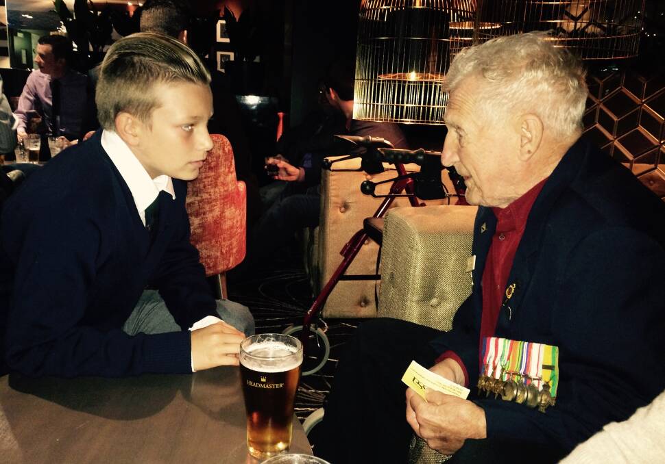 UNLIKELY FRIENDS: Kobey-Flynn sits with Walter 'Wally' Biles at the SS&A Club last ANZAC Day. Little did they know it would be their only meeting.