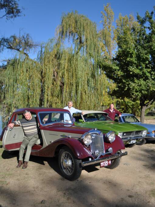 REVVING TO GO: Murray Heritage Motorists members John Adams, Doug Seacombe and Greg Oates have their cars ready for the big event next Sunday.