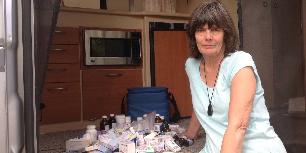 TIME FOR CHANGE: Yvonne Evans in her camper van with a six-month supply of medication, which she fears will soon run out. Picture: MICHAEL LACEY