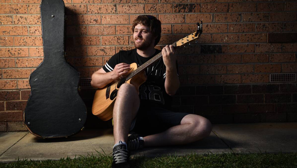 DREAMING BIG: Josh Campbell won't let vision impairment stop him becoming a musician or finishing his degree. Picture: MARK JESSER