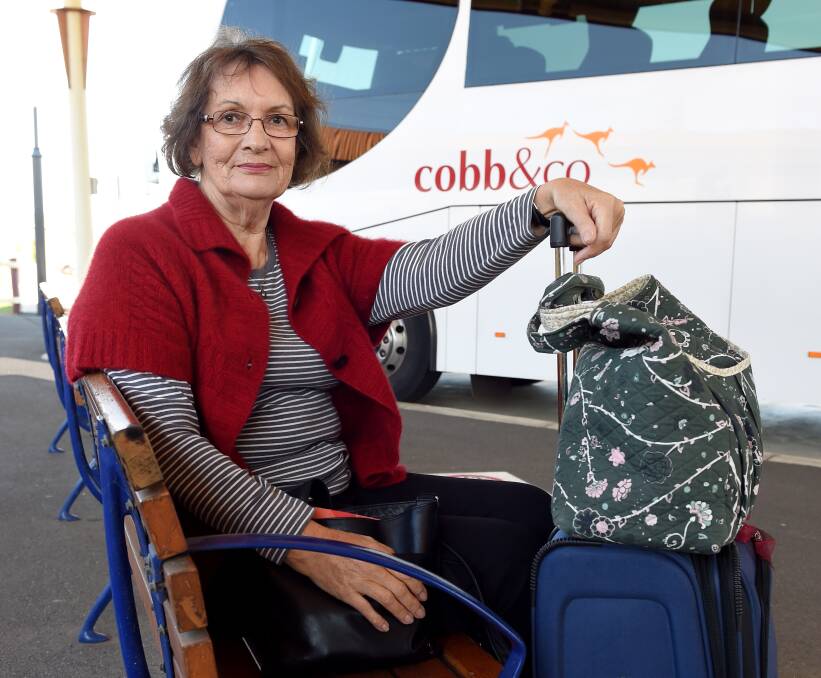 CROWDED COACHES: Judy Close, of Albury, packed her lunch in anticipation of a long journey to Sydney. She, like many passengers, said there was a lack of room on coaches when compared with train services. Picture: MARK JESSER