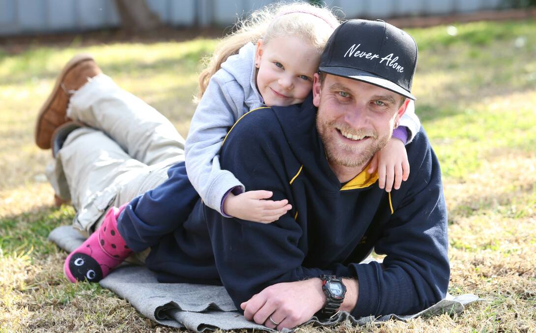 SPREADING THE MESSAGE: Pat Lawson from Corowa, with his daughter Charlotte, who returned from a mental health conference in Las Vegas.