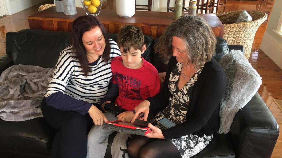 REAL SCENARIOS: Yasmin Keating, plays around on the Riverina Shore learning site with her son Aaron, 11 and Doctor Caroline Robinson.