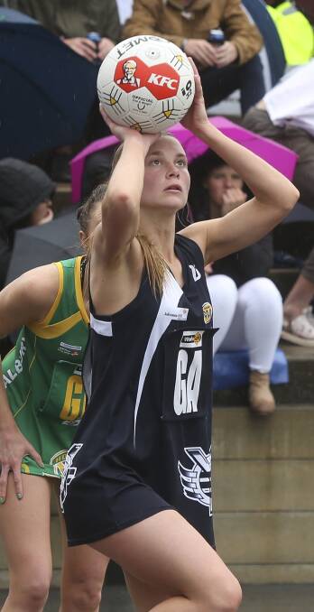 TAKING AIM: Kate Robilliard shoots for goal in the Pigeons' B grade victory over North Albury, at Lavington Oval, on Sunday. Pictures: ELENOR TEDENBORG
