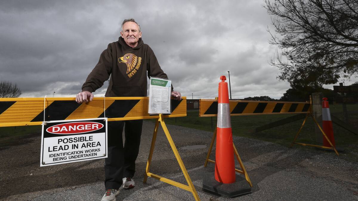NO ENTRY: Gary O'Keefe with barricades which prohibit people from entering the sport ground due to contamination.