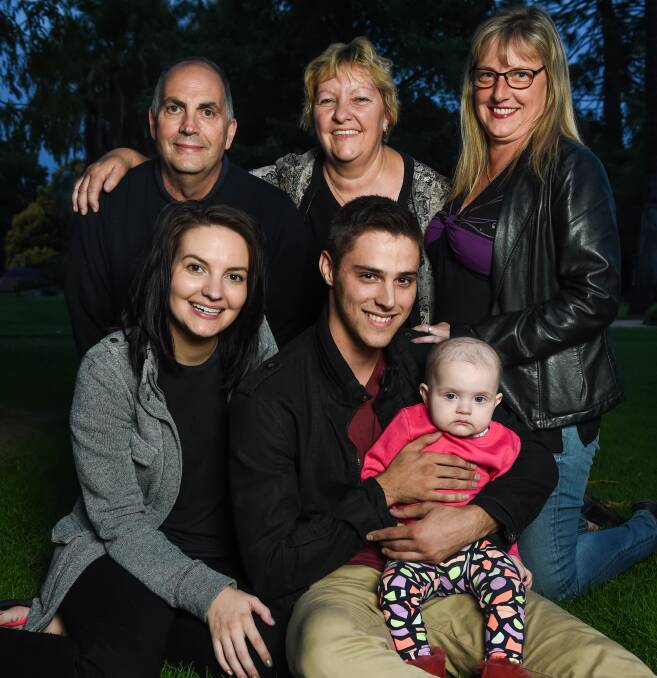 HAPPY FAMILY: Jeff Lang, Ronis Lang and Deanna Ballins with Stacey Lang, Kyle Yaldwyn and Mia Yaldwyn, 1, who are encouraging people to join the bone marrow register. Pictures: MARK JESSER