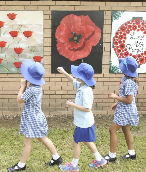 NOT FORGOTTEN: New murals by Kiewa Valley Primary School hang at Coulston Park in Tangambalanga. Picture: ELENOR TEDENBORG
