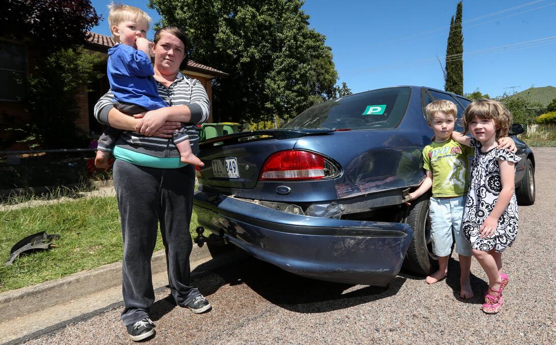 FINANCIAL FEAR: Tehnay Jones, mother of Jack Wallace, 1, John, 5, and Flair Wallace, 4, worries for Christmas after a hoon damaged her car. Picture: JAMES WILTSHIRE